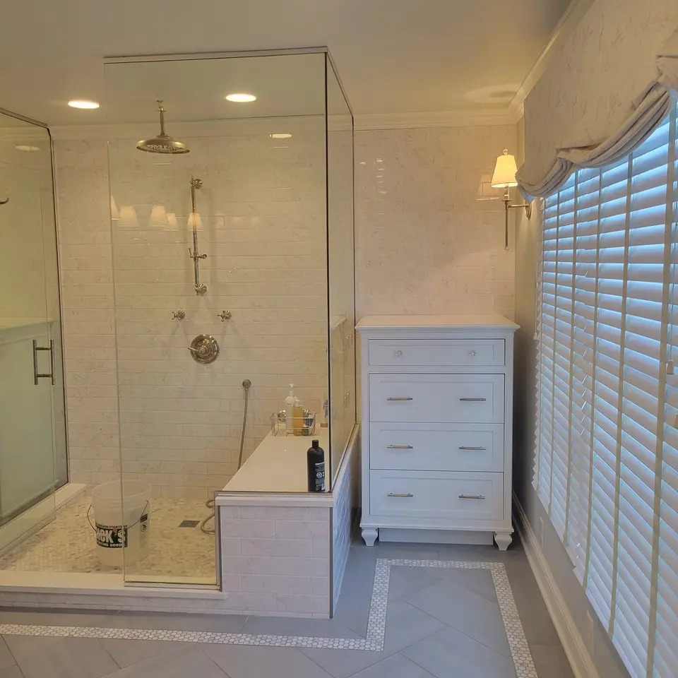 Glass-enclosed custom shower remodel